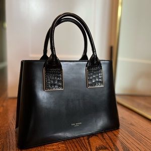 Ted Baker leather handbag (two handles), multiple internal pockets / sections.